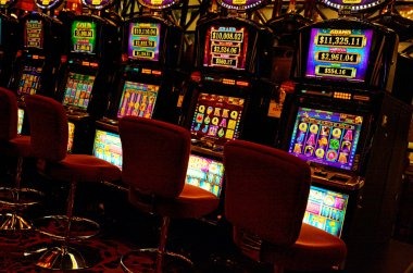 Live baccarat table with dealer and cards on dafatoto slot